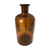 Old thick glass amber bottle