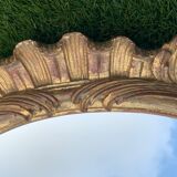 Old mirror in carved wood and gilded leaf, Louis XV rocaille style, twentieth century 59x87cm