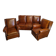 Living room with a sofa and wingback armchairs.