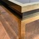 Coffee table in brass and black lacquer by Guy Lefèvre for Maison Jansen