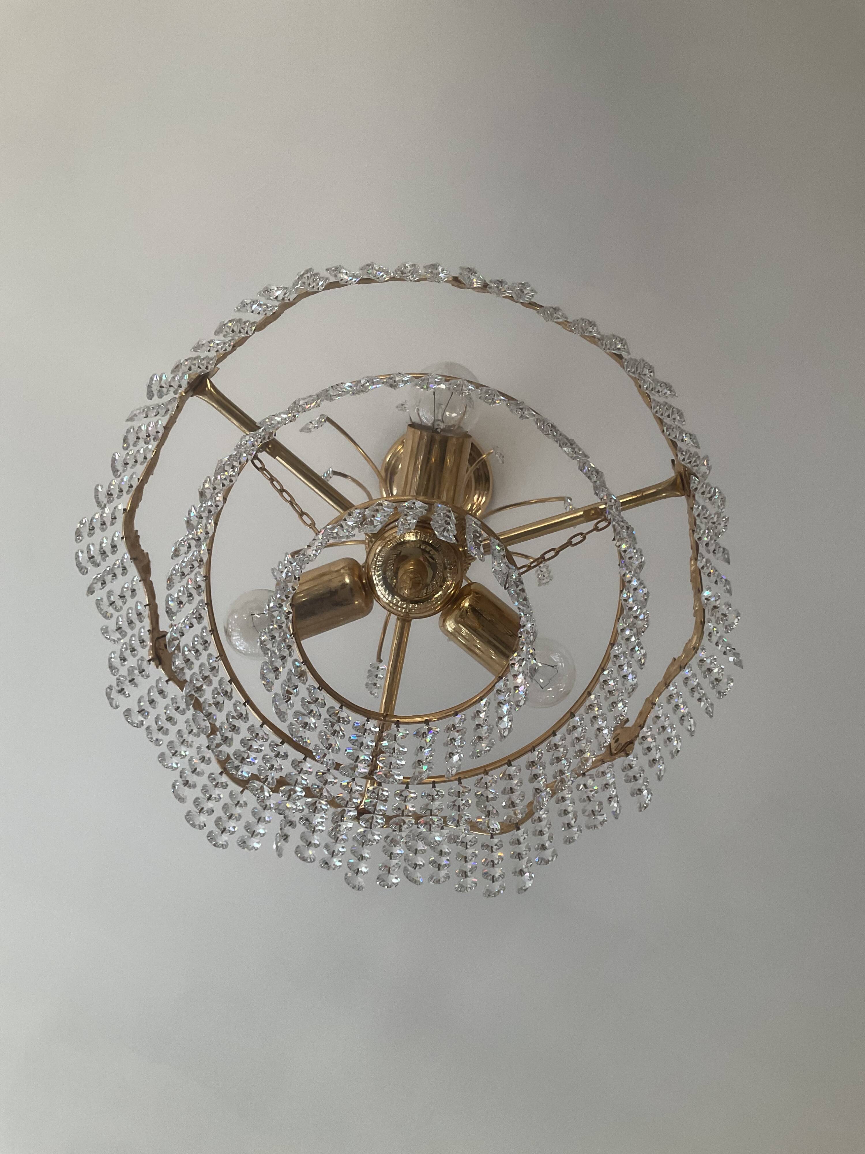 Cascade chandelier with bronze and crystal pendants