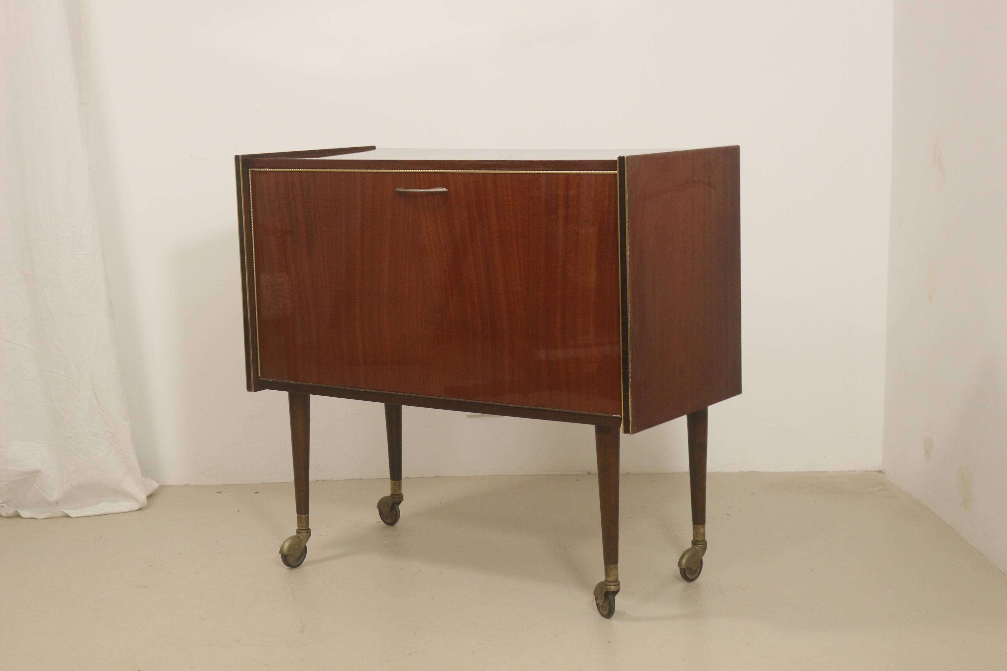 Bar cabinet on wheels circa 1950