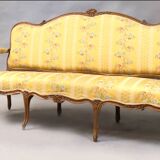 Natural wood canapé, moulded and carved, late 19th to early 20th century.