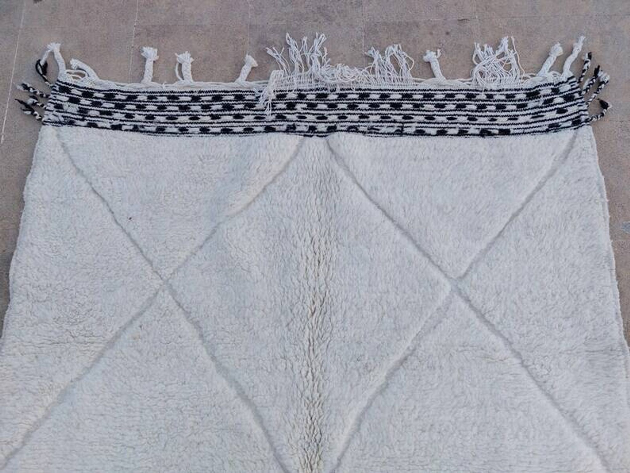 Tapis blanc en laine naturelle