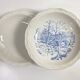 Set of two matching soup plates, one plain and one decorated