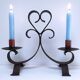 Patinated wrought iron candle holder heart pattern two lights