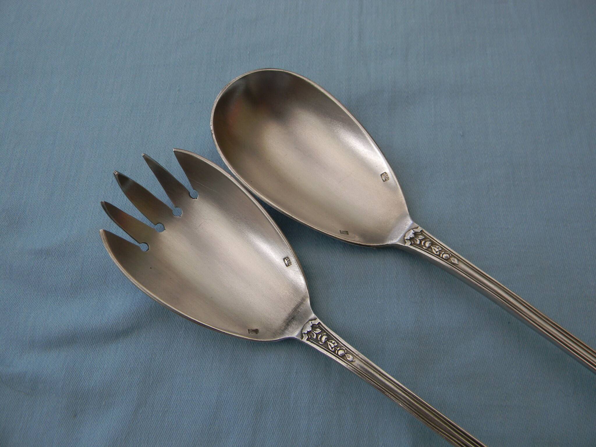 SFAM silver metal salad servers.