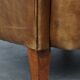 Fauteuil club en cuir de vachette couleur cognac clair