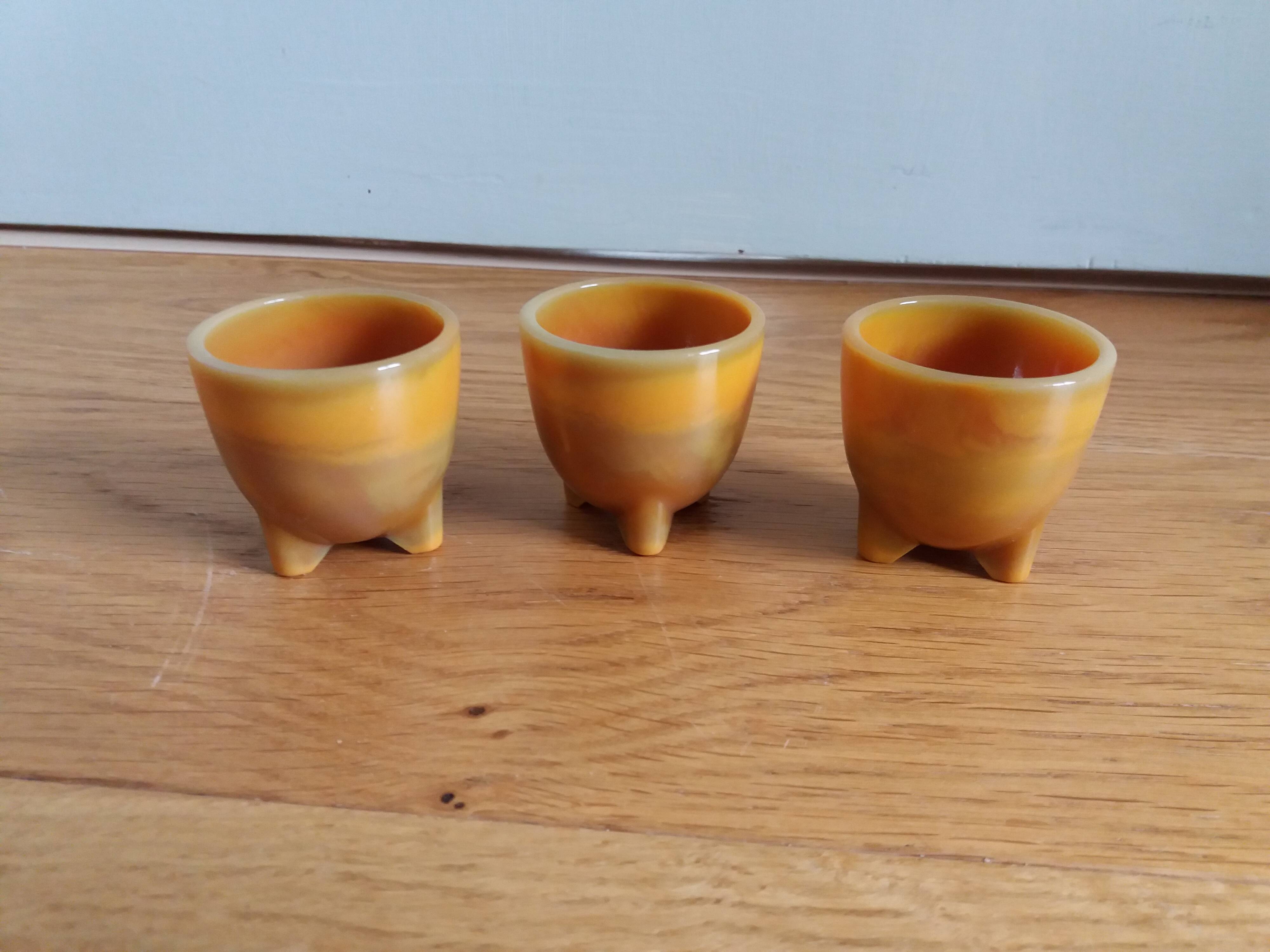 Marbled glass tripod egg cups