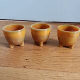 Marbled glass tripod egg cups