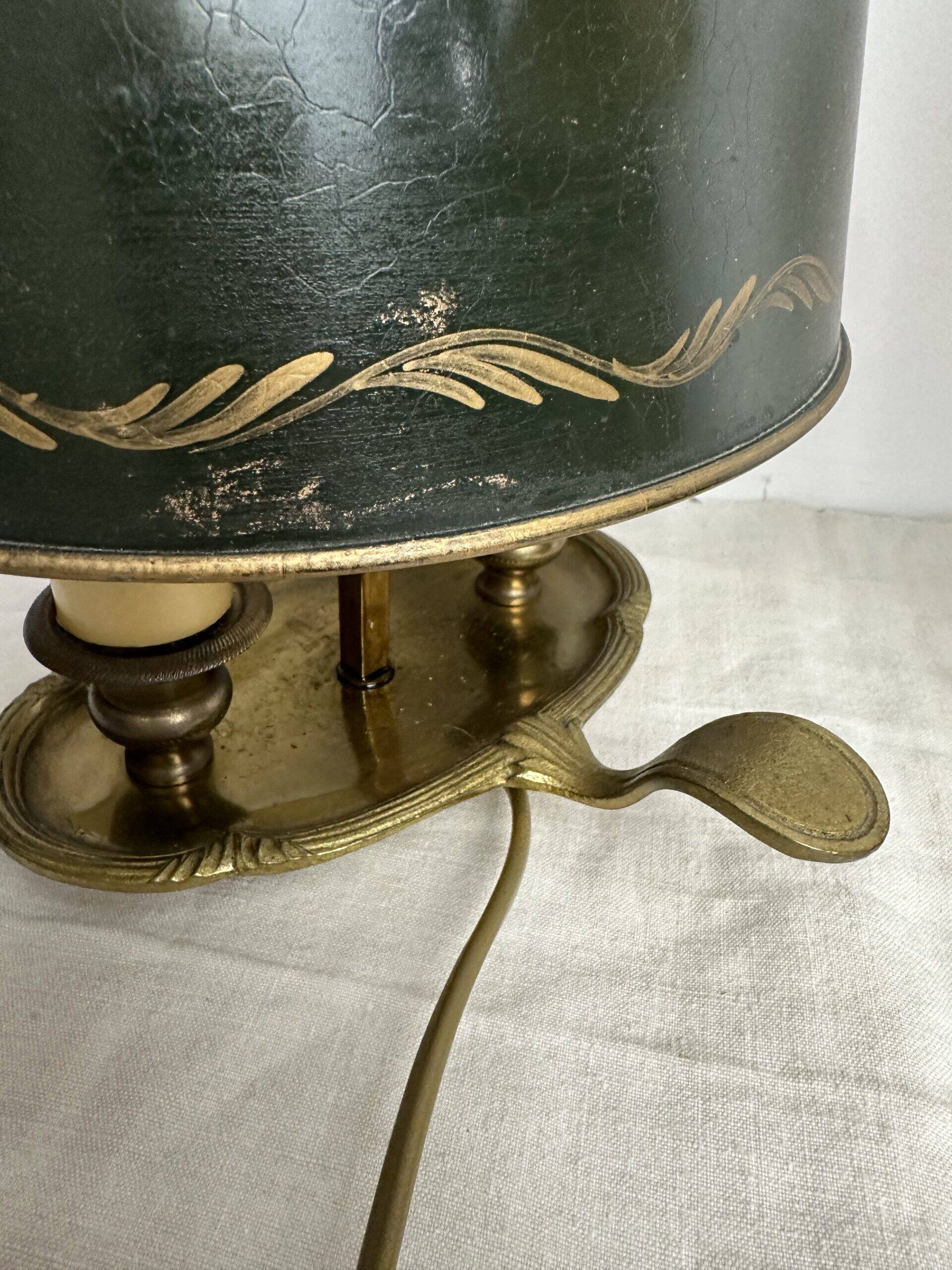 A pair of old brass bed warmers.