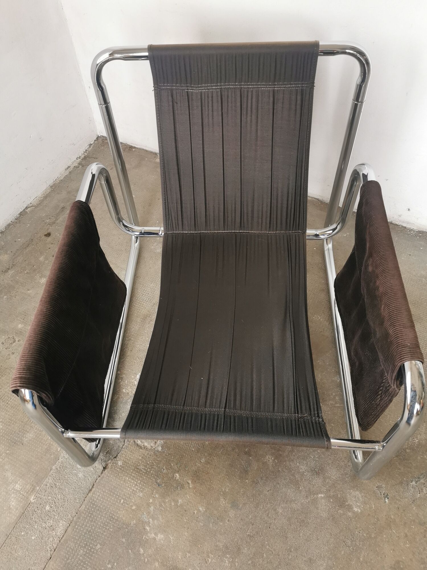 Velvet and tubular metal armchair 1980