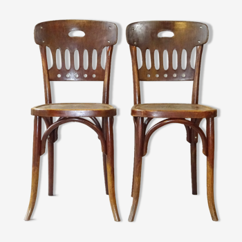 Lot de 2 chaises Japy bistrot 1925, assise bois à motif Art nouveau