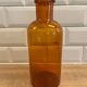 Amber glass bottle vase