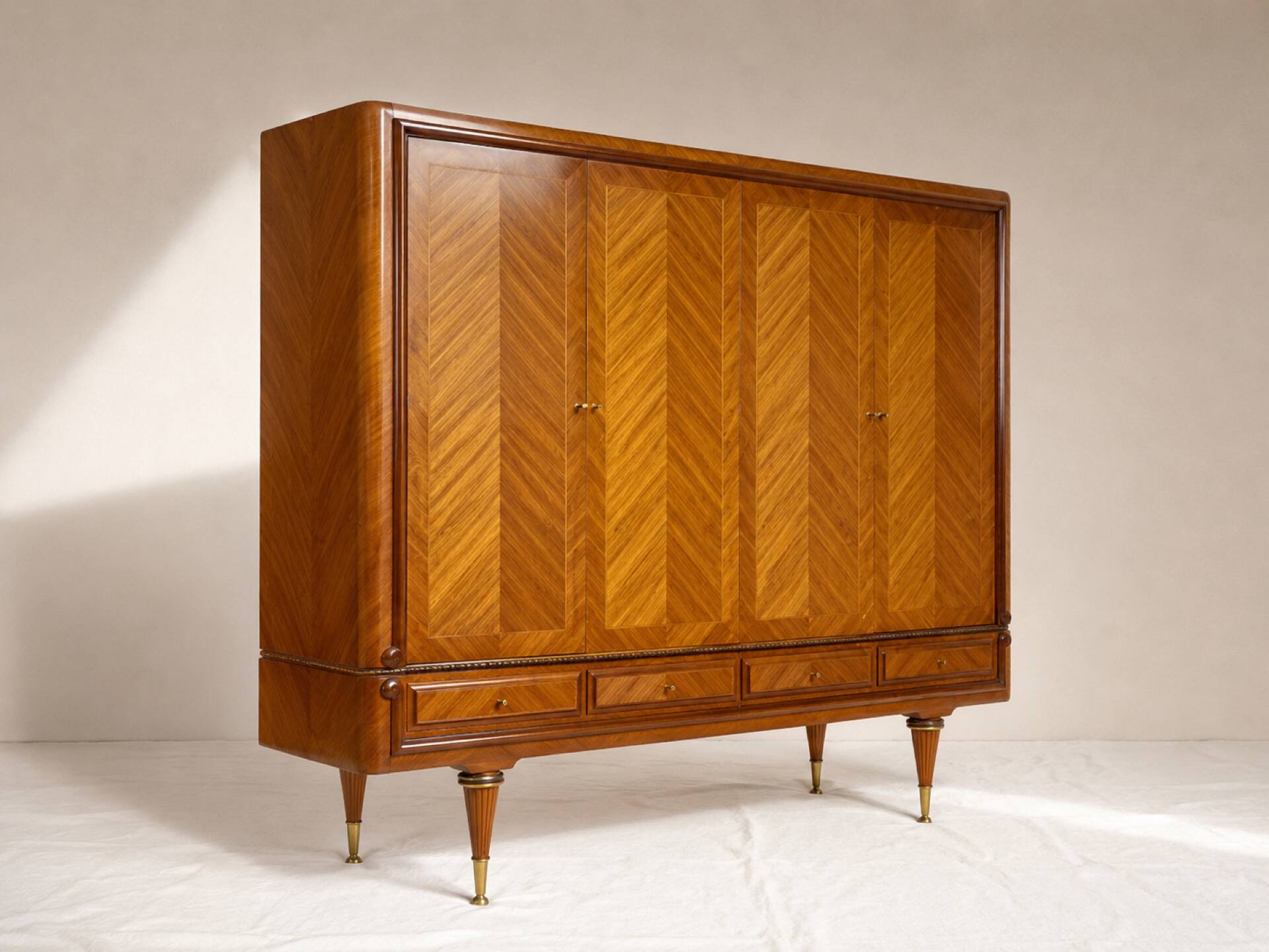 Vintage 4-door chevron wood wardrobe with mirror and gold legs.