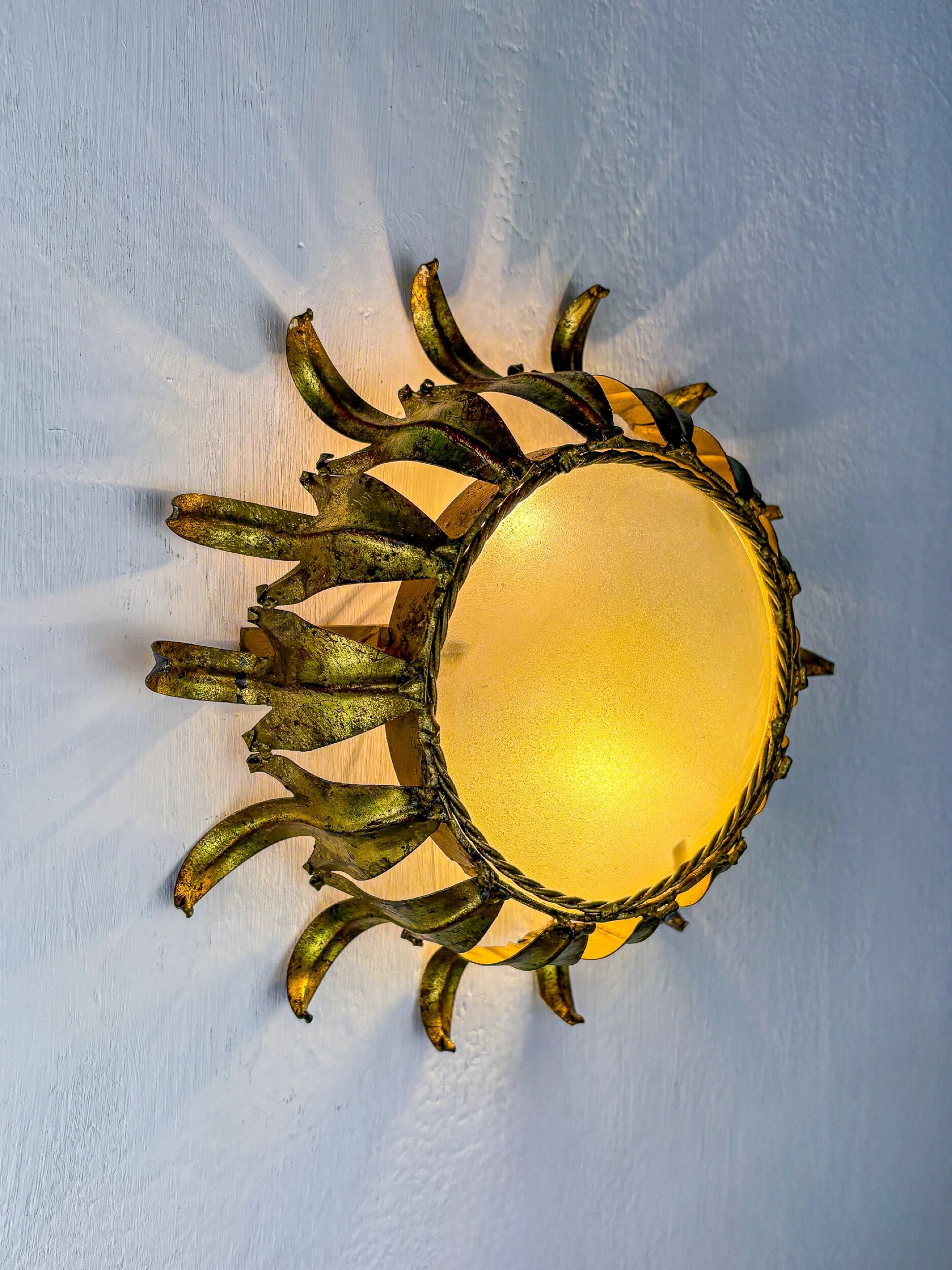 Spanish crown sunburst fixture in gilt metal and frosted glass, 1950s