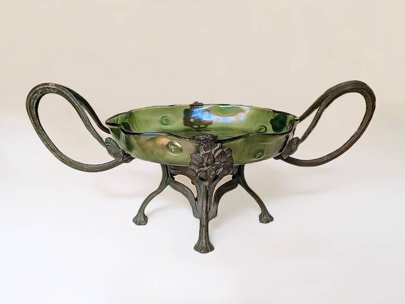 Art Nouveau cup in iridescent glass and bronze-style metal