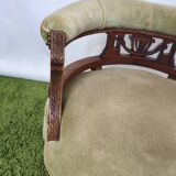 Old green velvet empire chair