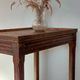 Vintage wooden wheeled side table/console.