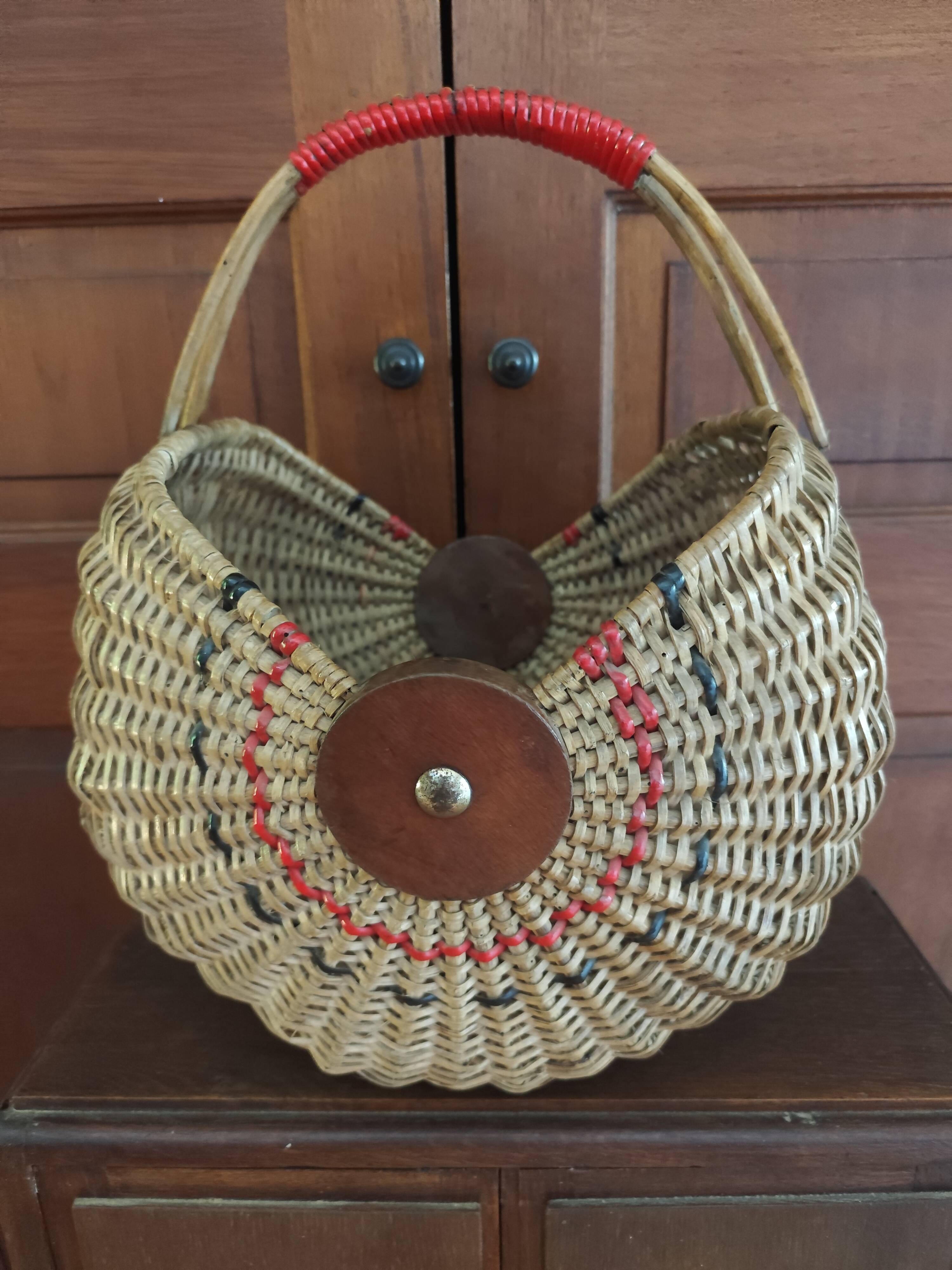Large antique half-moon rattan basket