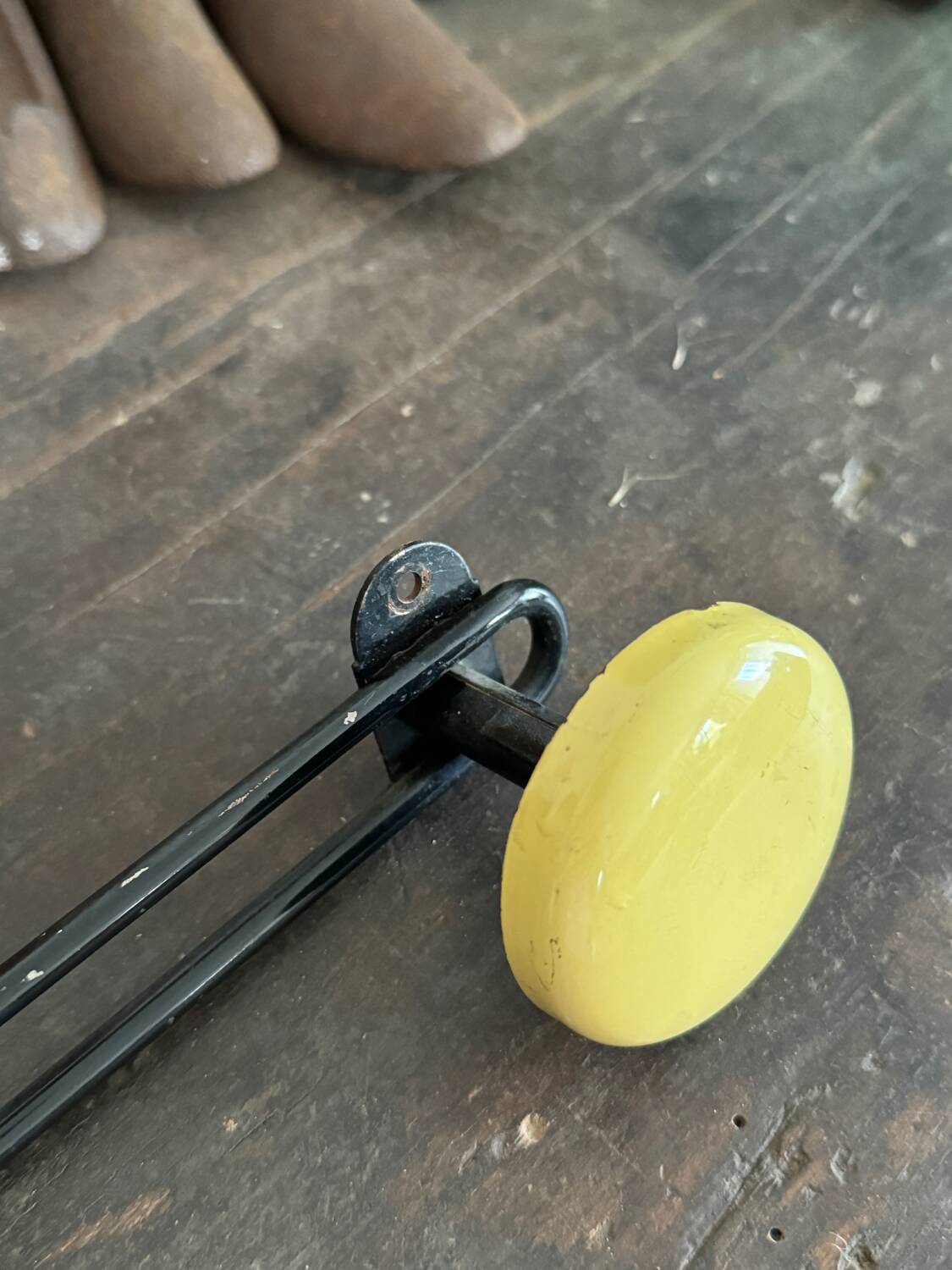 Wall coat rack with 4 vintage yellow metal hooks