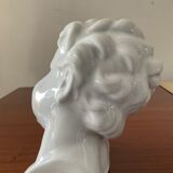 Cherub child bust in enamelled porcelain