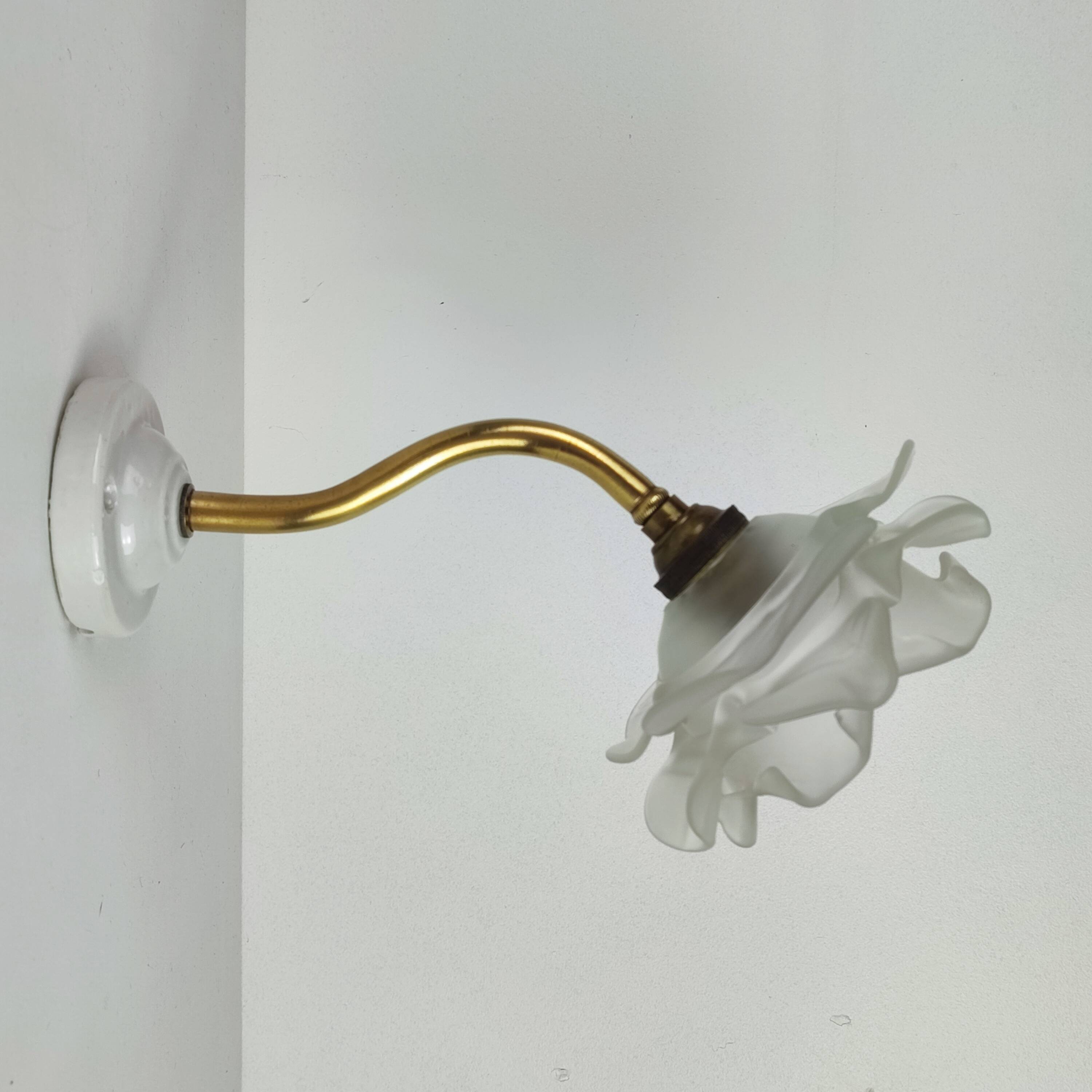 Brass and glass “flower” wall light