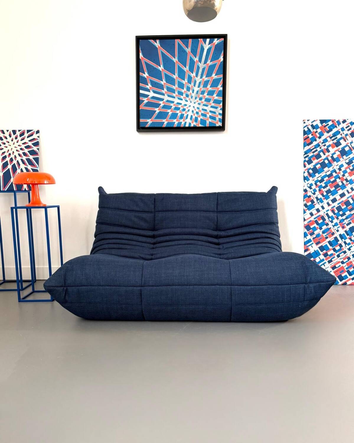 Two-seater sofa reupholstered.