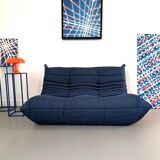 Two-seater sofa reupholstered.