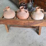 Old wooden jar holder with 3 clay jars