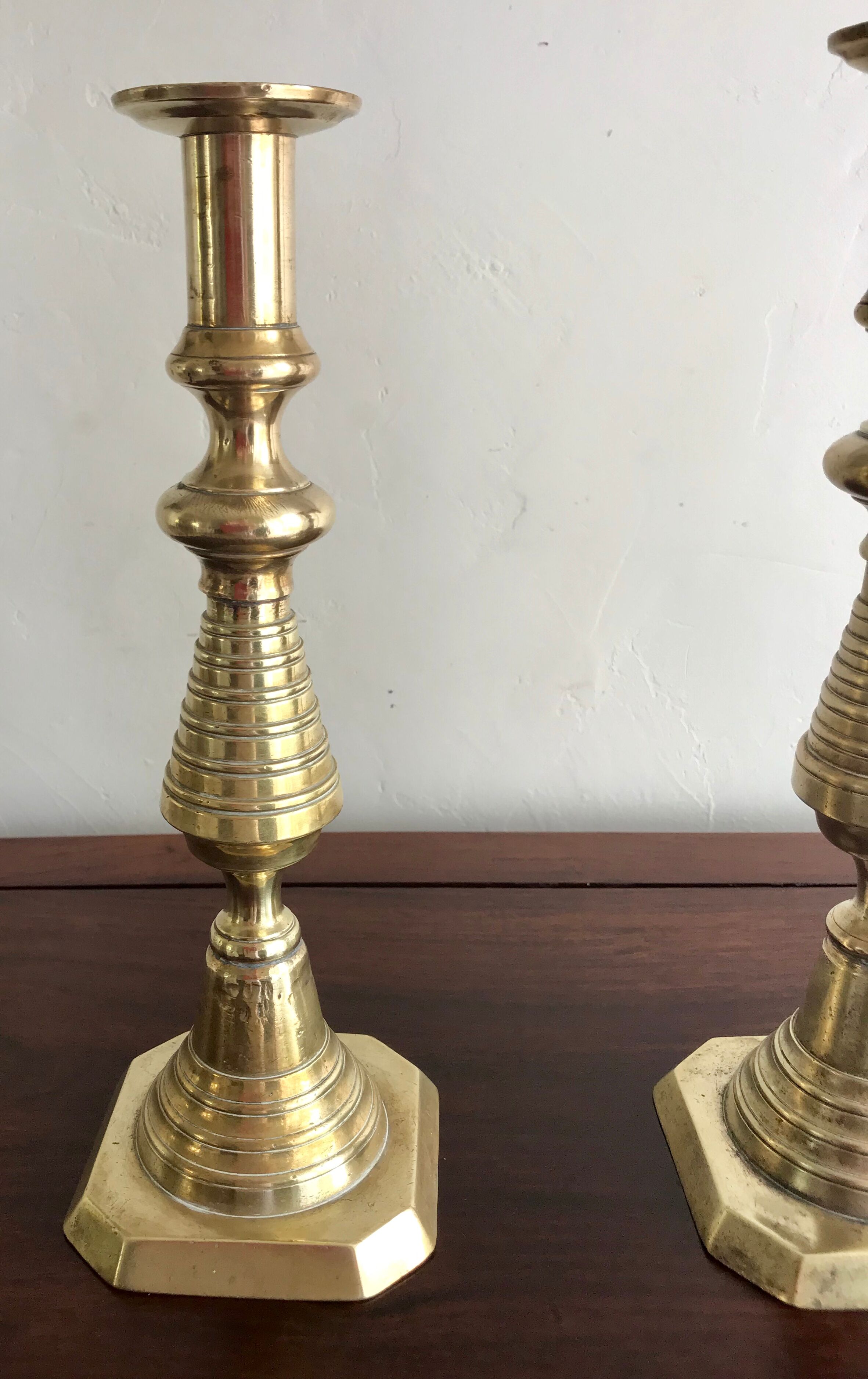 Pair of old brass candlesticks
