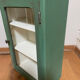 Small wooden cabinet patinated arsenic green