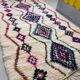 Moroccan Berber rug in cream wool with multicoloured diamonds – 250 × 147 cm