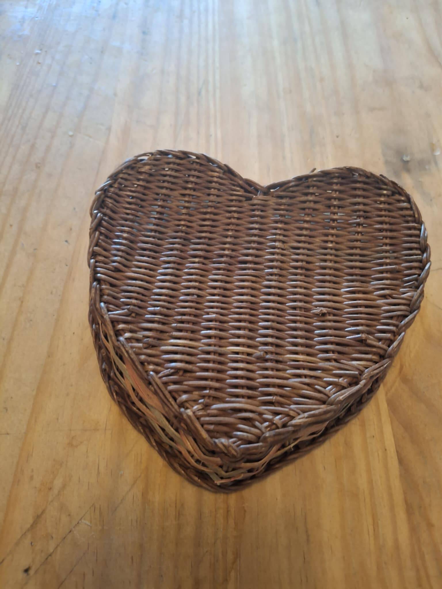 Small wicker basket in the shape of a heart.