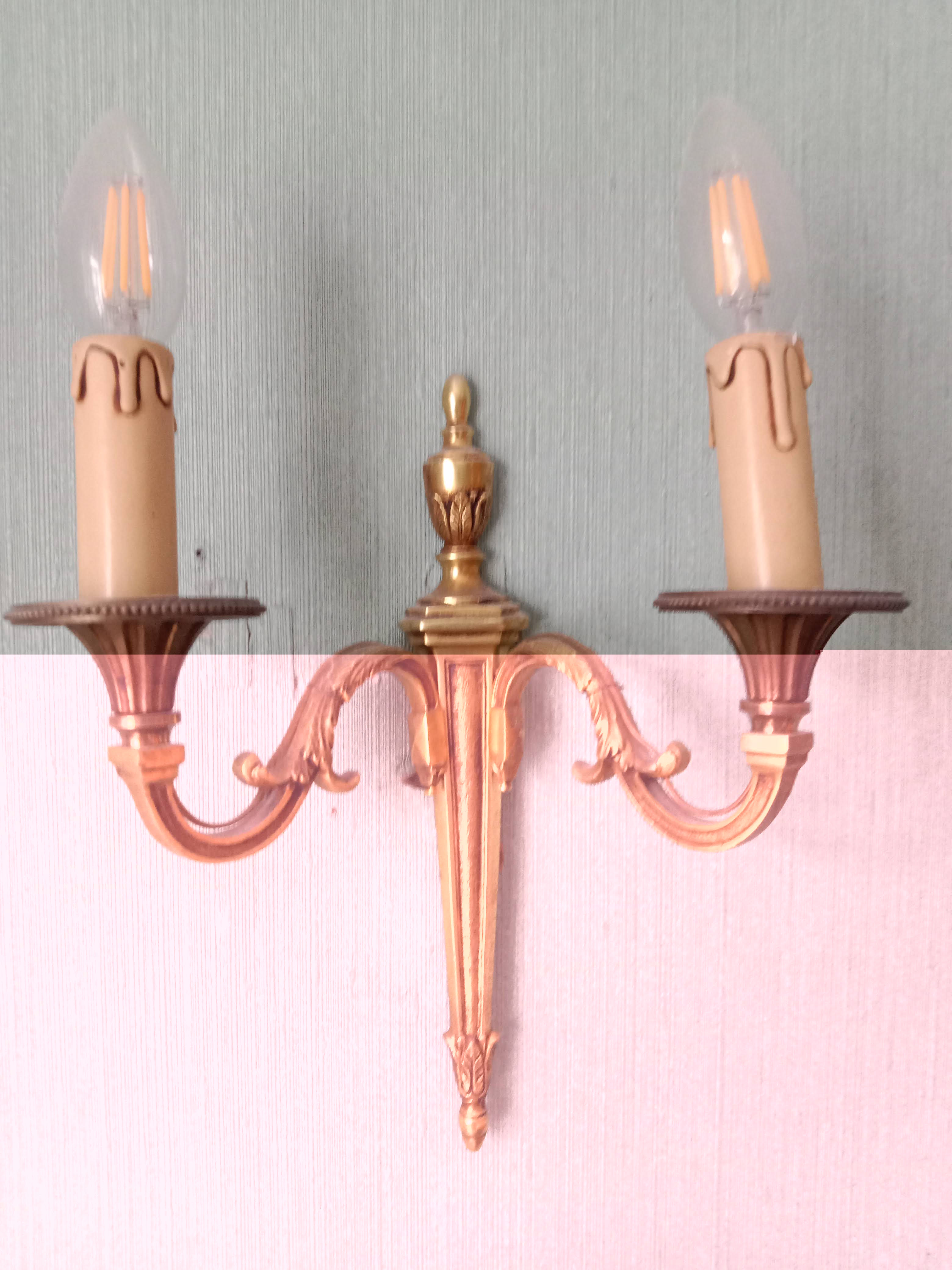The pair of bronze wall lamps empire style 2 fires