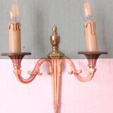 The pair of bronze wall lamps empire style 2 fires