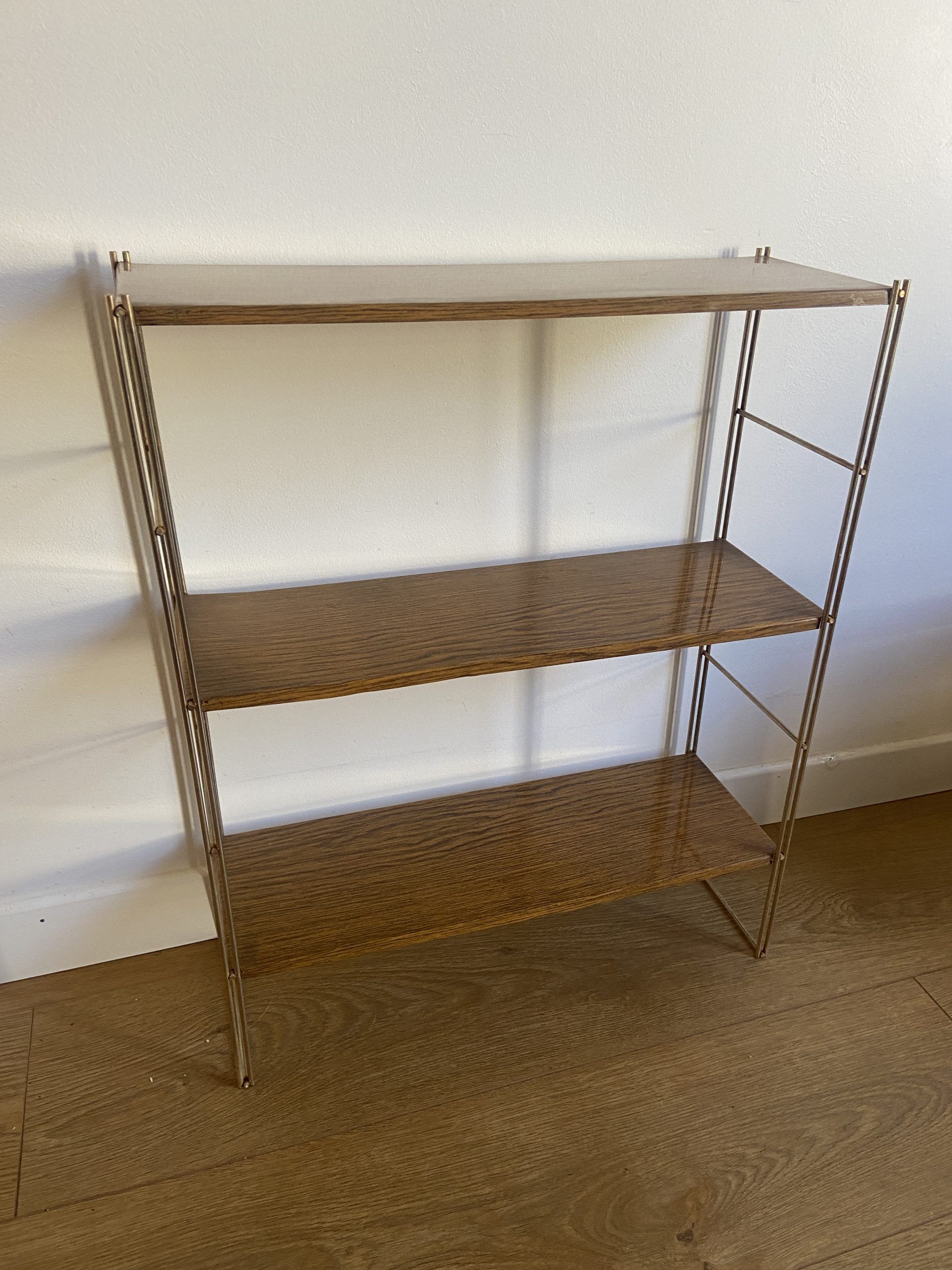 Self vintage metal wall shelf imitation wood in string or tomado style