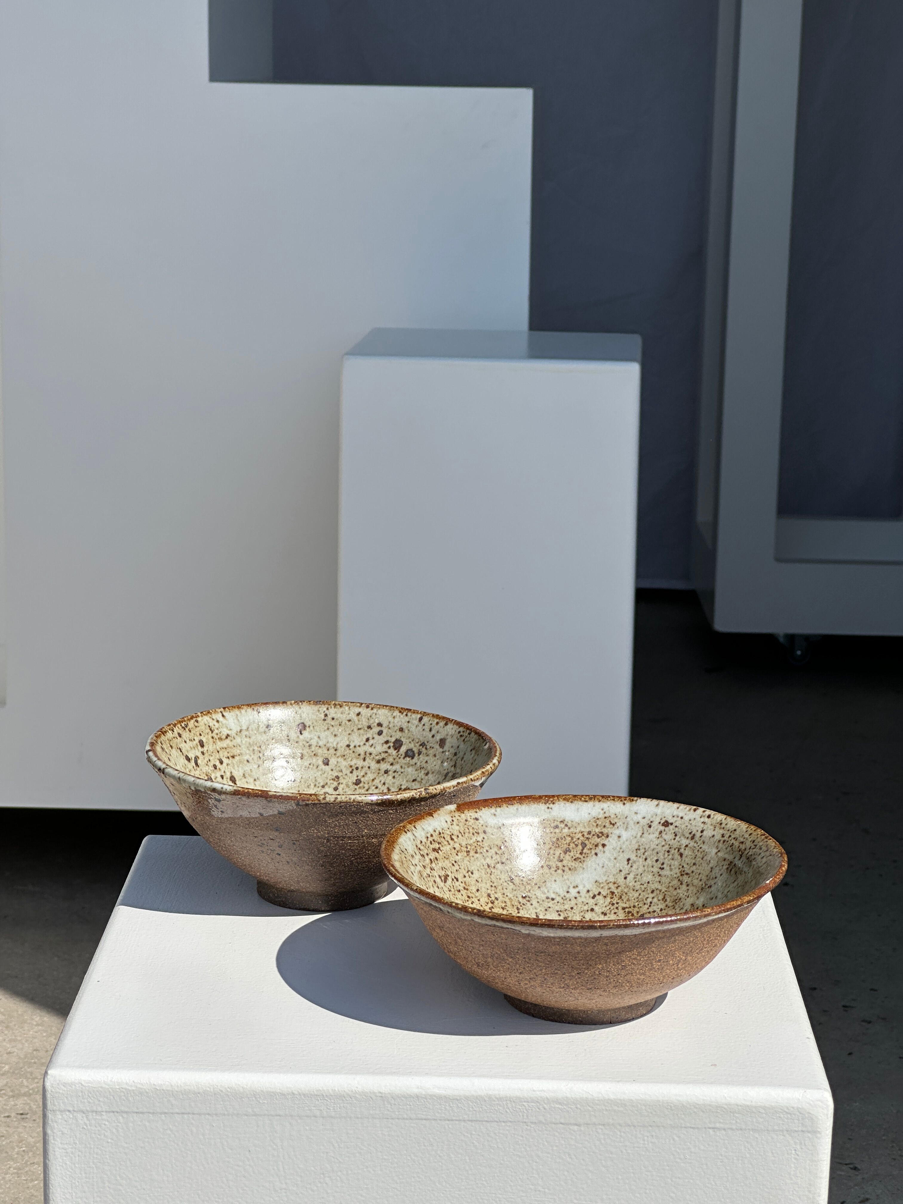 Duo of ceramic bowls interior glazed exterior matt raw earth