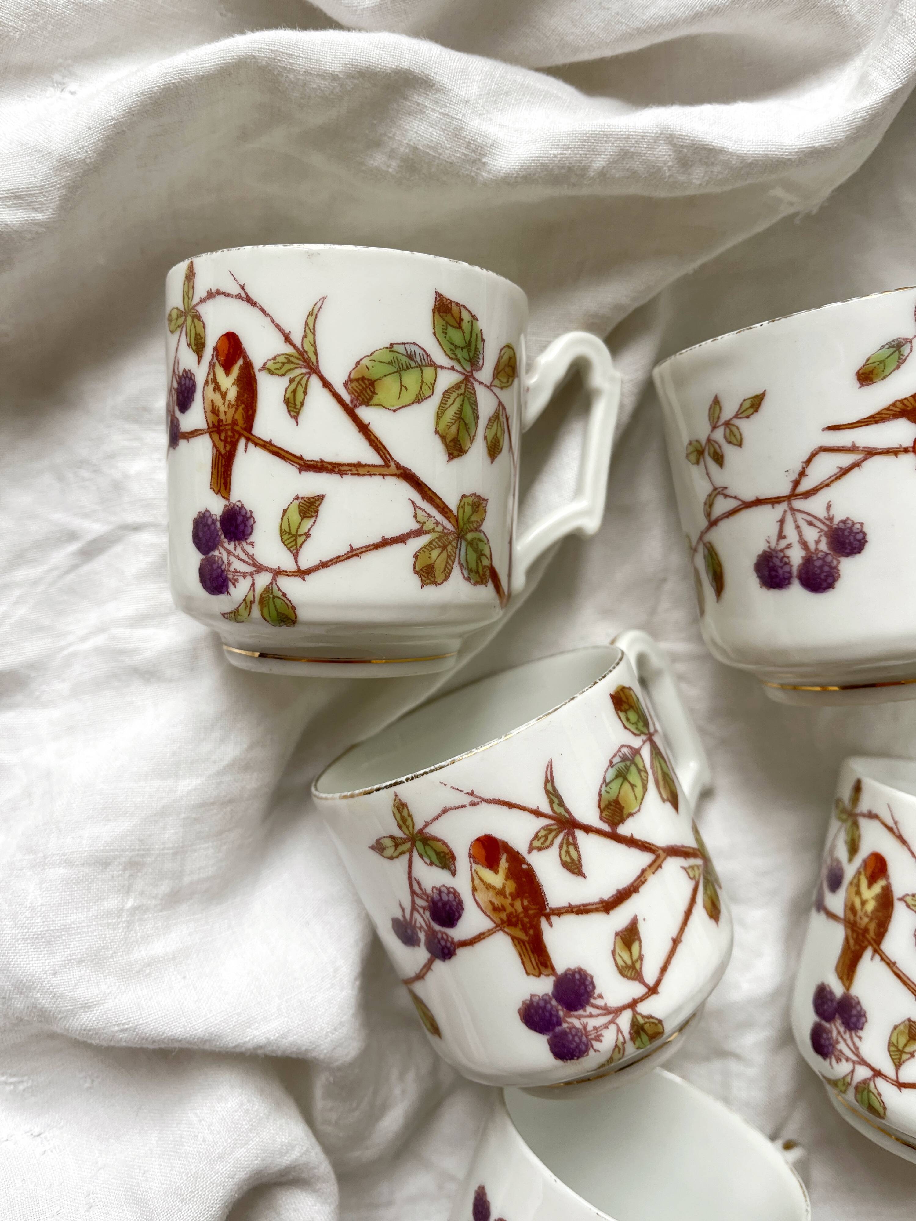 5 antique porcelain coffee cups decorated with birds