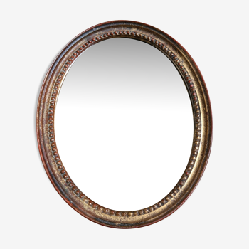 Ancien miroir ovale en bois doré vintage