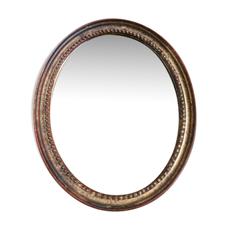 Ancien miroir ovale en bois doré vintage