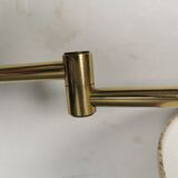 Danish Brass wall lamp with a ‘swivel’ effect.