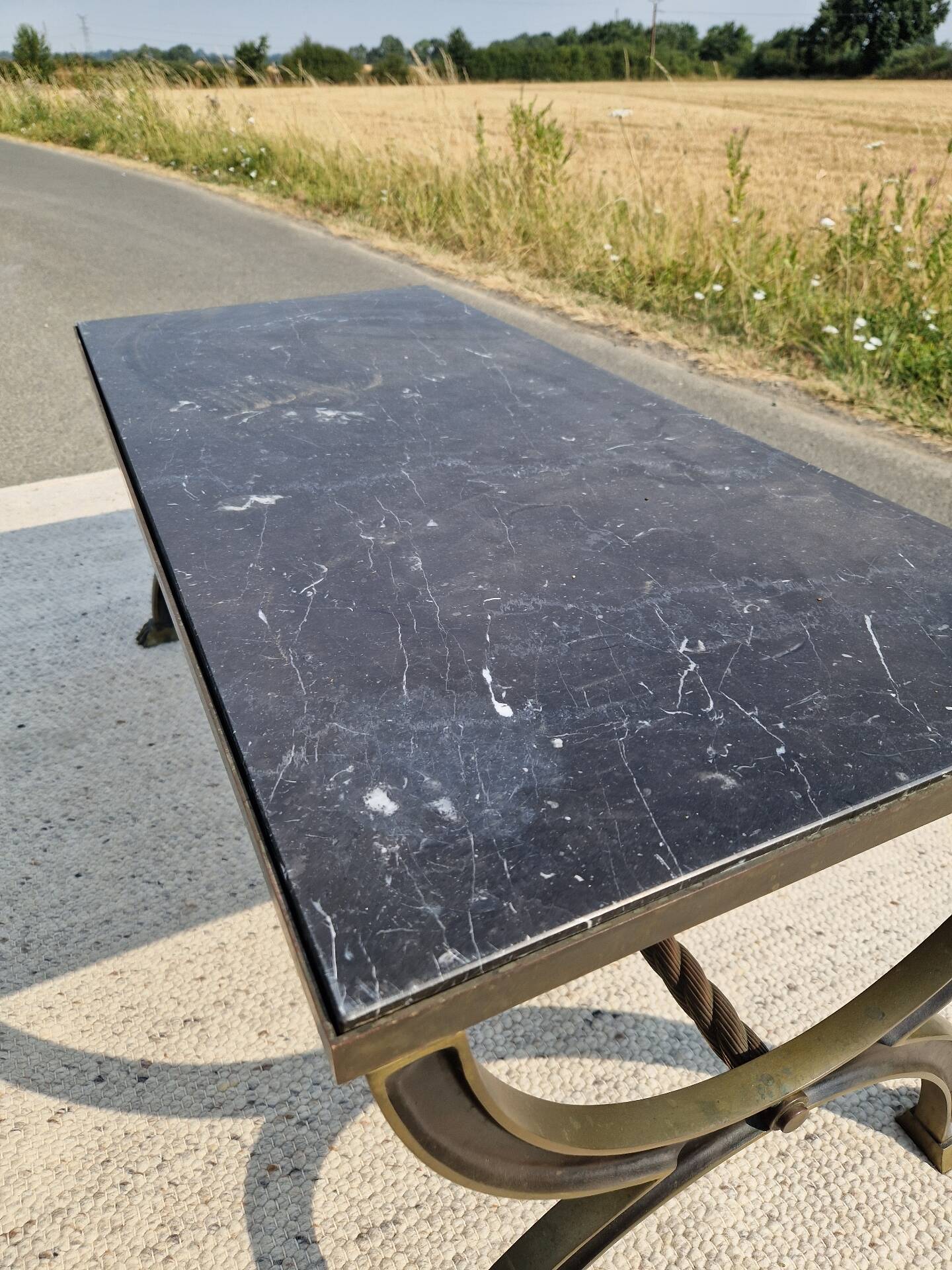 Low tables with marble tops in Neoclassical style.