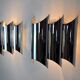 Pair of Raak wall lamps, space-age chrome design, Germany, 1970