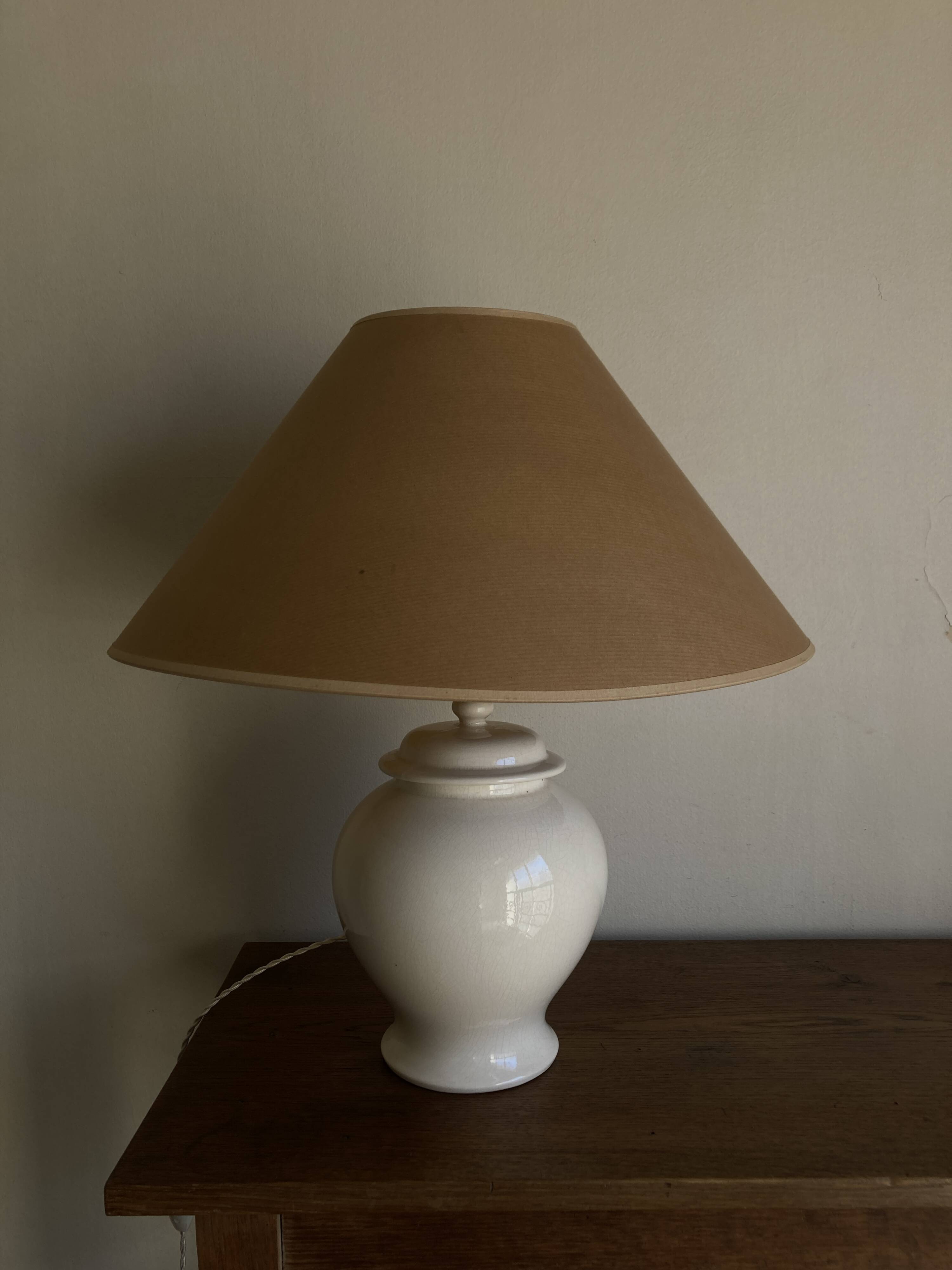 Neo-classical baluster lamp in cracked white earthenware from the 1970s.