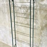 Rigid metal shoe shelf on legs - 1950