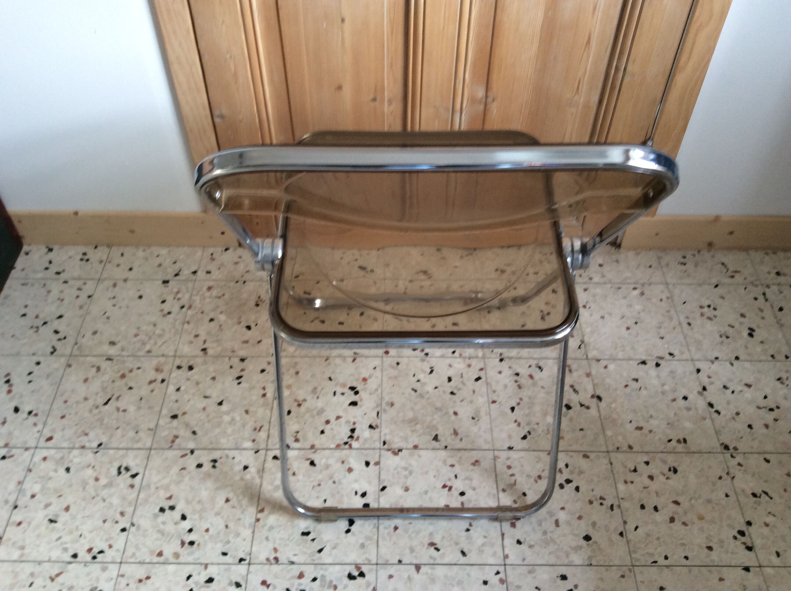 Folded chair by Giancardo Piretti for Castelli