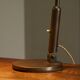 Modernist desk lamp in patinated brass from the 1930s.