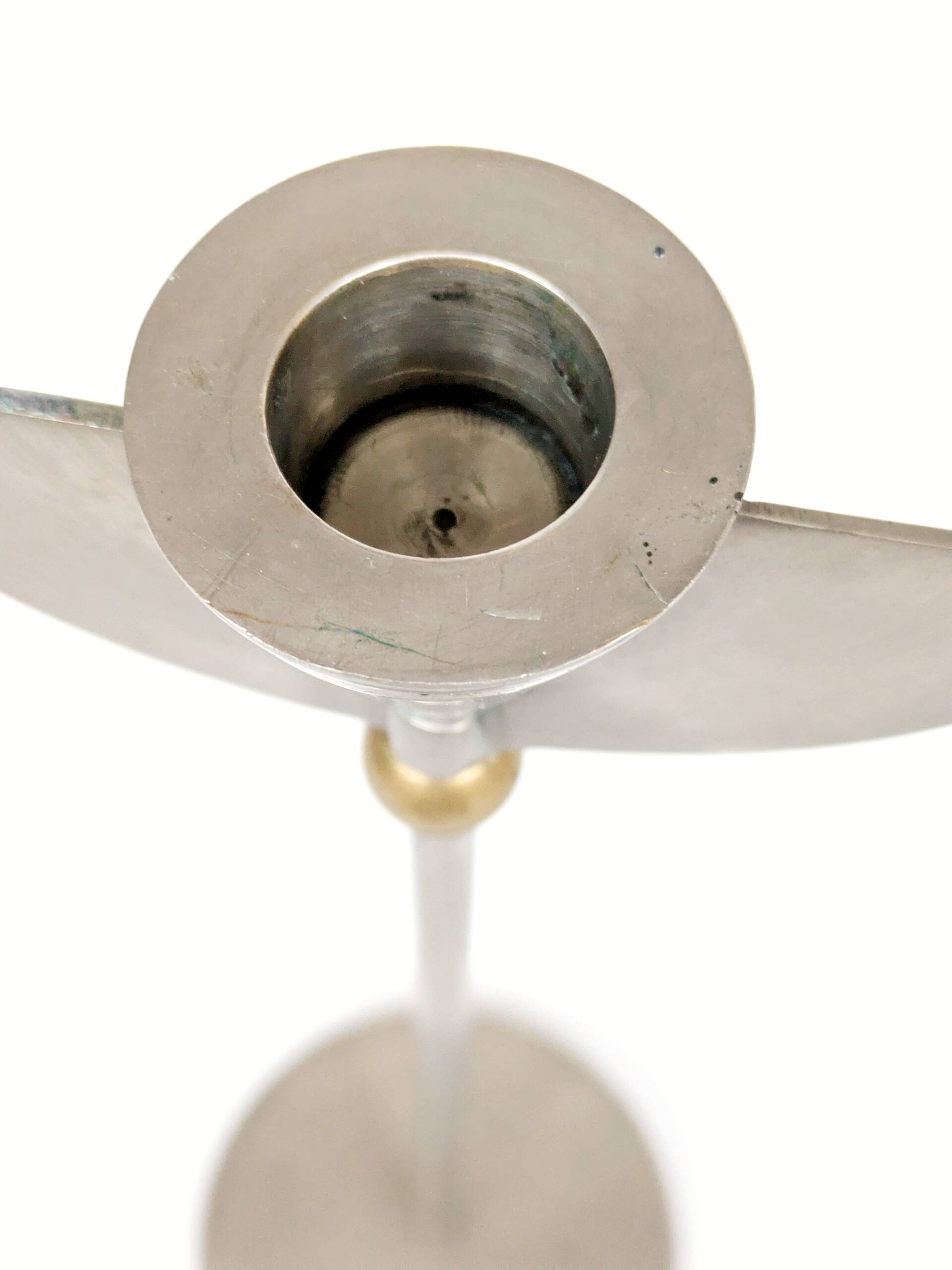 Pair of postmodern 1980s candlesticks, stainless steel and brass