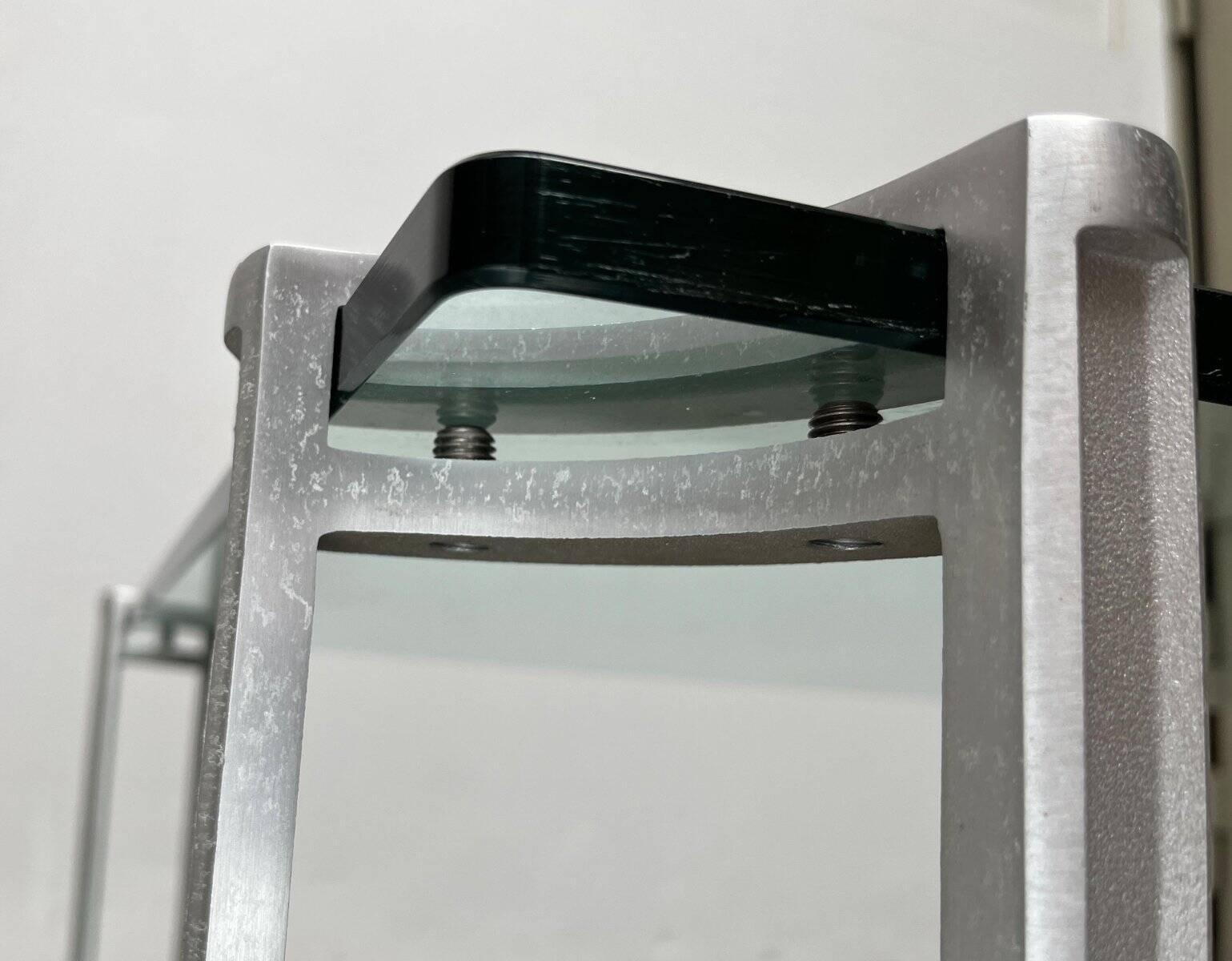 Vintage Space Age coffee table in glass and aluminium attributed to Peter Ghyczy, 1970s.